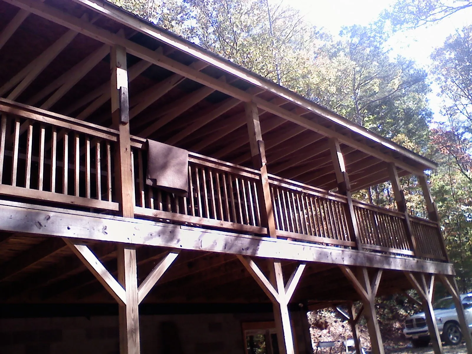 Timber framing under a new elevated porch and deck — Roof Leak Repair in Monticello by Roofing Brothers